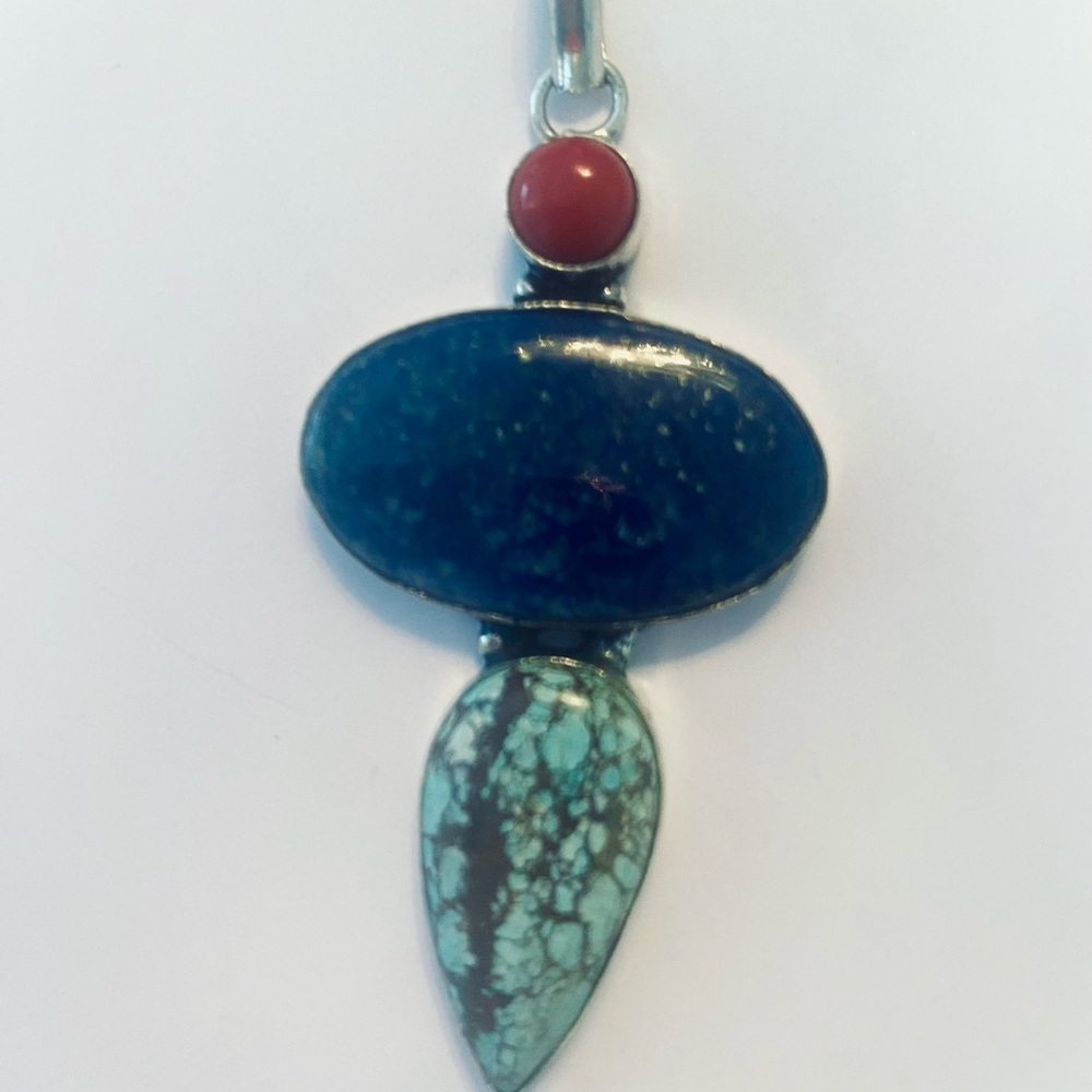 2 1/2 inch, Lander Turquoise, Lapis Lazuli, and Coral pendant on silver chain.
